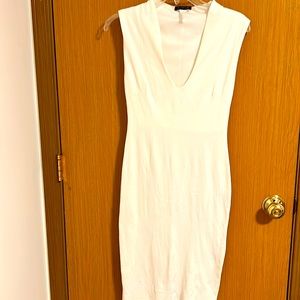 A midi dress, white color, brand Instate.
